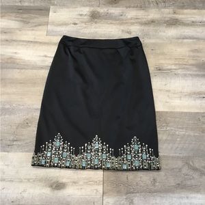 JS Collections Jewelled Satiny Black Skirt, heavily embellished along hem.